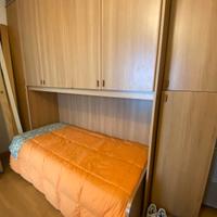 Armadio a ponte 6 ante con letto
