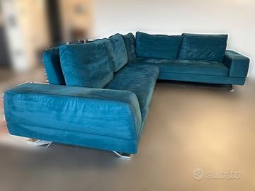 Divano con schienale traslante