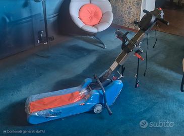 Montascale cingolato Vimec T09 per trasporto carr