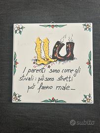 Piastrella da appendere