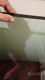 tavolino in cristallo con base granito 