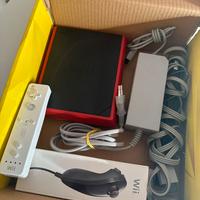 Wii mini + controller + nunchuck + gioco