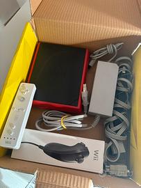 Wii mini + controller + nunchuck + gioco