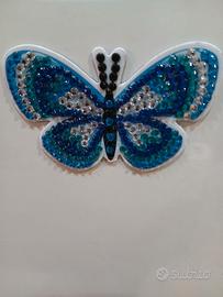 Calamite a forma di farfalla fatte a mano