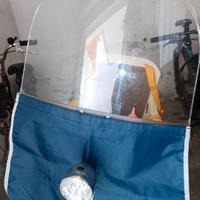 Seggiolino ant. , paravento,protezione piedi Bici