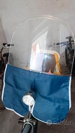 Seggiolino ant. , paravento,protezione piedi Bici