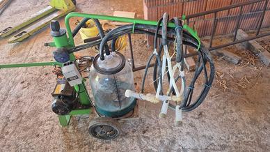 Mungitrice cattura e bidoni