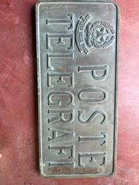 Antica insegna delle poste in bronzo