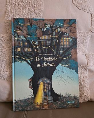 Libro albo illustrato Il venditore di felicità