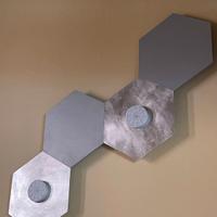 Luci da muro color acciaio forma esagonale 