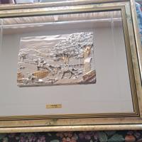 quadro a specchio con paesaggio in rilievo. 