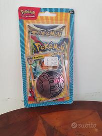 Pokemon blister x 2 pacchetti + moneta pawmot