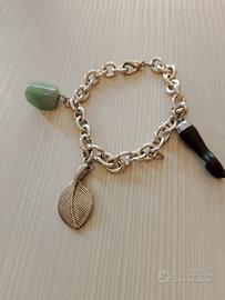 braccialetto colore argento con pietra verde,