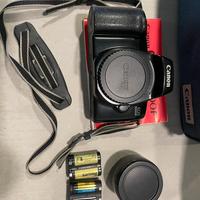 Fotocamera Canon eos 1000f + Sakar 2x