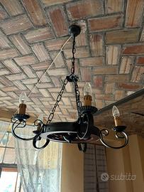 Lampadario a fomra di ruota cariola