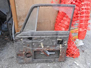 Lancia Fulvia berlina portiere, marmitta, fari