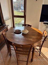 Tavolo rotondo stile legno noce massello