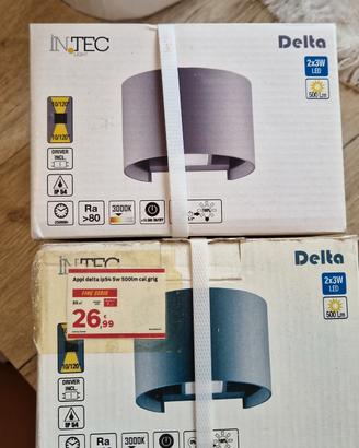 Coppia di applique da esterno in metallo grigio