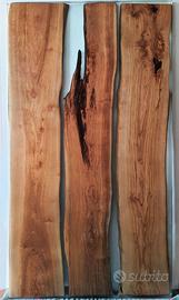 Tavolo il legno d’ulivo e resina trasparente