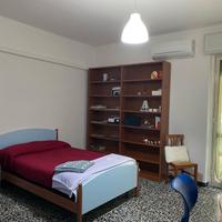Ampia camera arredata, 2 bagni, via Is Mirrionis