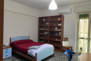 Ampia camera arredata, 2 bagni, via Is Mirrionis