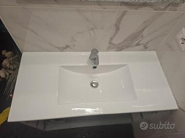 Lavabo da incasso con miscelatore