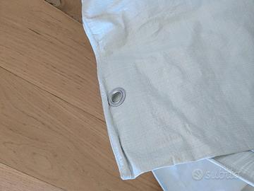 telo impermeable con occhielli 