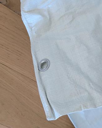 telo impermeable con occhielli 