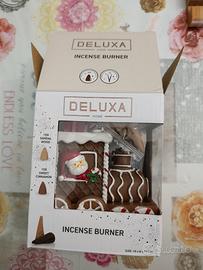 Brucia incenso a forma di trenino natalizio,