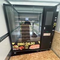 Distributore automatico scalda cibo