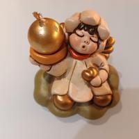 Angelo Thun con candela su nuvola