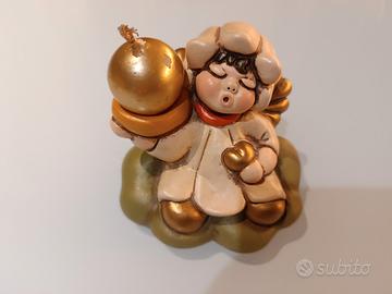 Angelo Thun con candela su nuvola