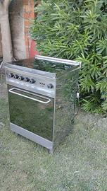 Fornello 4 fuochi con forno elettrico in acciaio