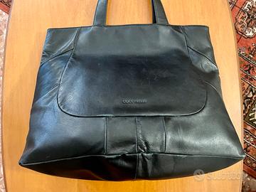 Borsa Coccinelle in pelle nera con portafoglio