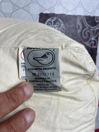 Piume doca per inbuttitura