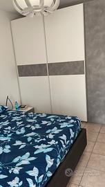 letto matrimoniale con 2 comodini e armadio 5 ante