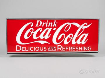 Insegna luminosa Coca-Cola