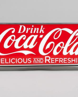 Insegna luminosa Coca-Cola