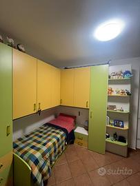 Camera da letto componibile ad angolo