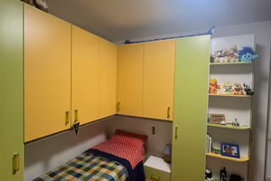 Camera da letto componibile ad angolo