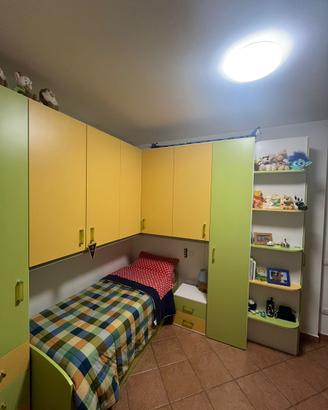 Camera da letto componibile ad angolo