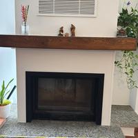 Trave in legno e pietra per camino