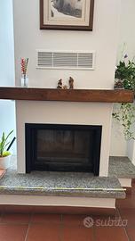 Trave in legno e pietra per camino