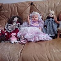 Bambole varie. Porcellana, plastica, stoffa