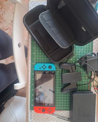 nintendo switch con giochi e accessori