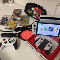 Nintendo Switch oled piu accessori e giochi