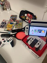 Nintendo Switch oled piu accessori e giochi