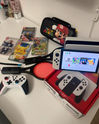 Nintendo Switch oled piu accessori e giochi