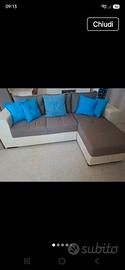 divano con chaise longue contenitore