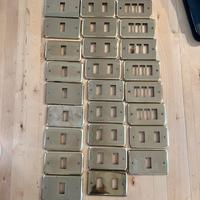 Placche per interruttori in ottone